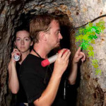 Couple exploring abandoned gold mine in Costa Rica